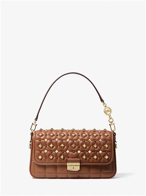 michael kors bradshaw small studded convertible shoulder bag|Bradshaw Small Studded Convertible Shoulder Bag .